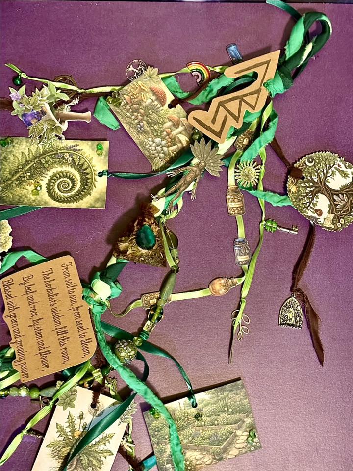 Herbalist cord magic close up with botanical charms and fairy figurine by Loren Morris, Primitive Witchery