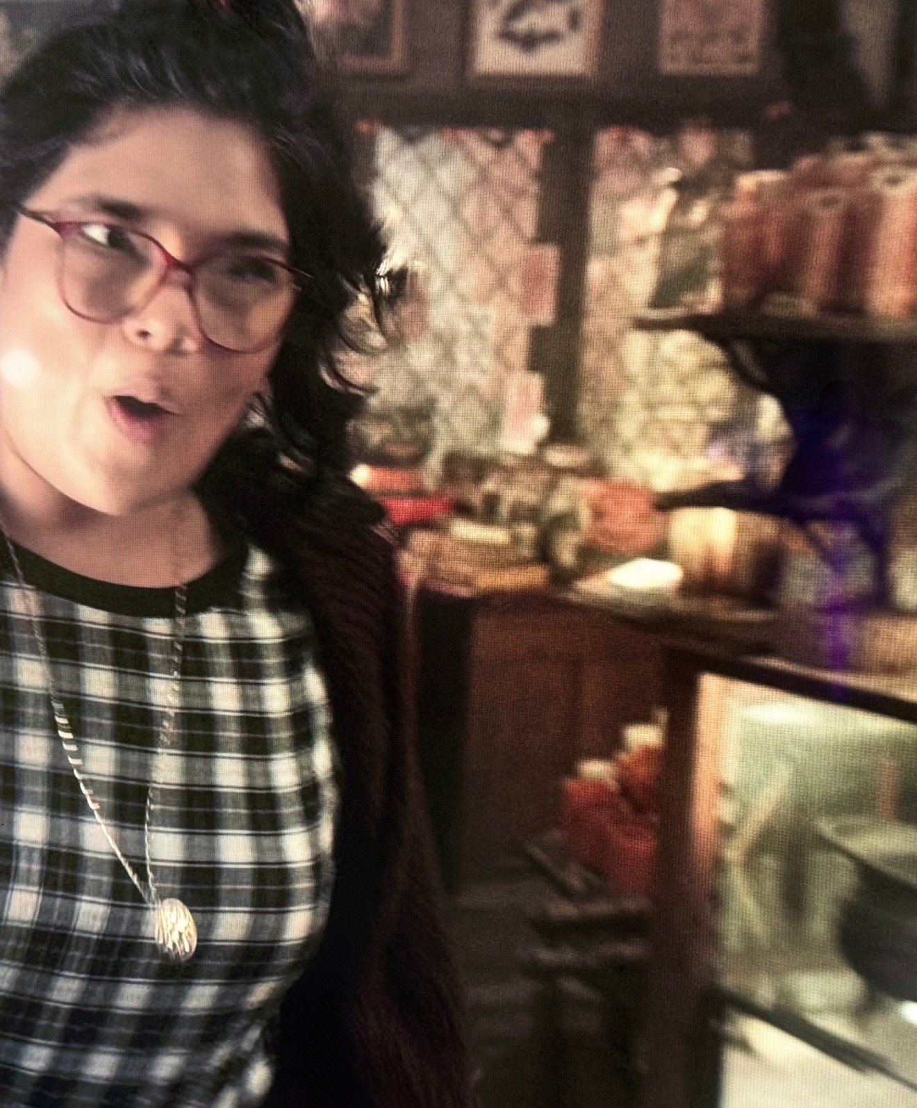 Loren Morris on the set of Hocus Pocus 2 with her work visible in the background